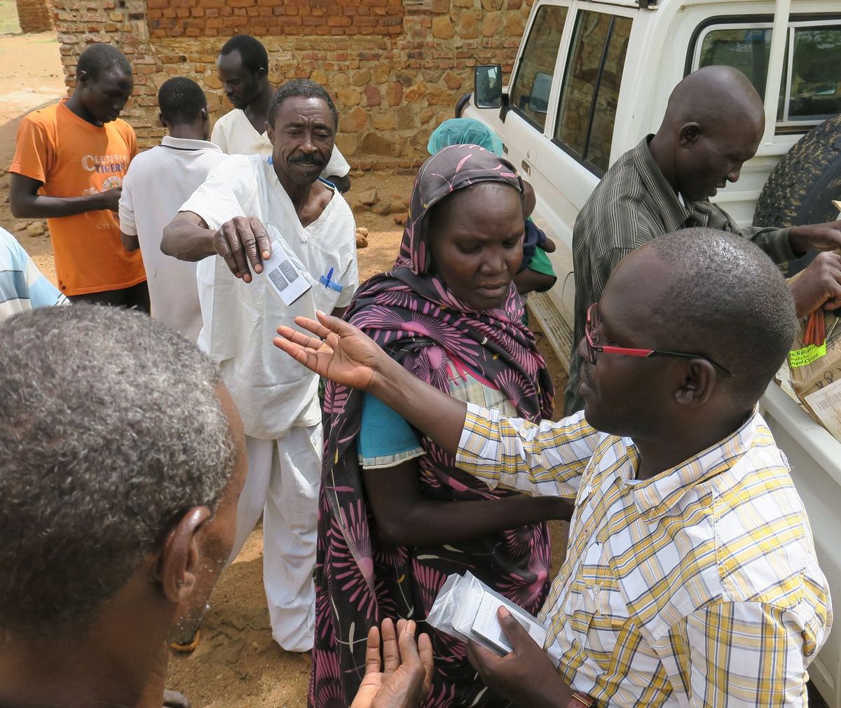 Audio Bible players handed out at a community distribution